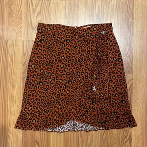 Leopard print mini skirt with ruffle accent
